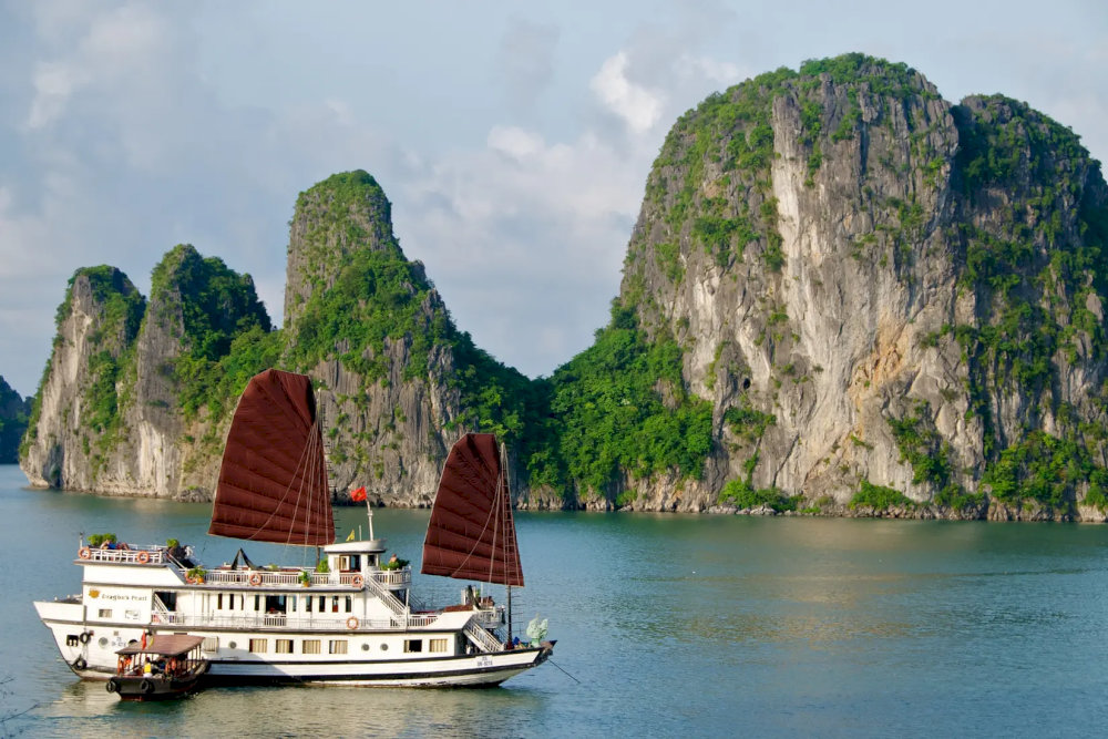 The full package includes boat transfers, buffet lunch, and access to all facilities, and costs approximately VND 1,000,000 (USD 40)